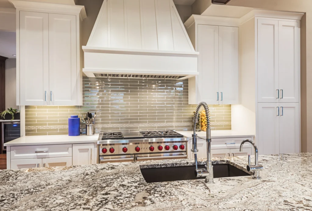 Custom kitchen remodel with island and tile backsplash by Royal Kitchen & Bathroom Remodels in Duluth.